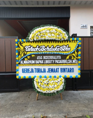 Papan Bunga Duka di Gumuruh